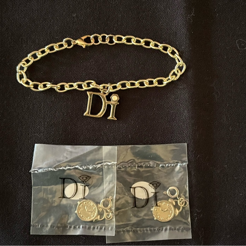 Diamond International Gold Charm Bracelet Set. 8 bracelets multiple charms. - Picture 12 of 15